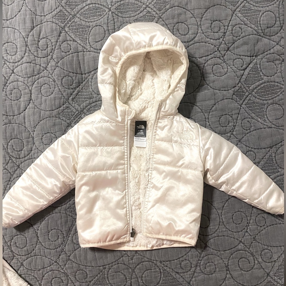 The North Face 6-12 month reversible ivory jacket. Barely worn
